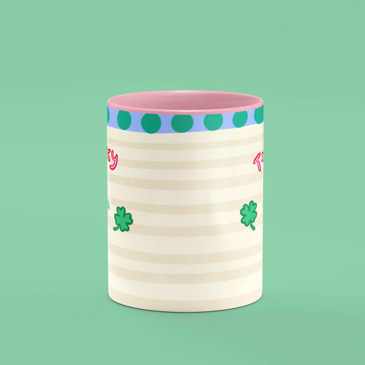 Front view of the Lucky Club Mug showing the illustrated lucky charm emblem