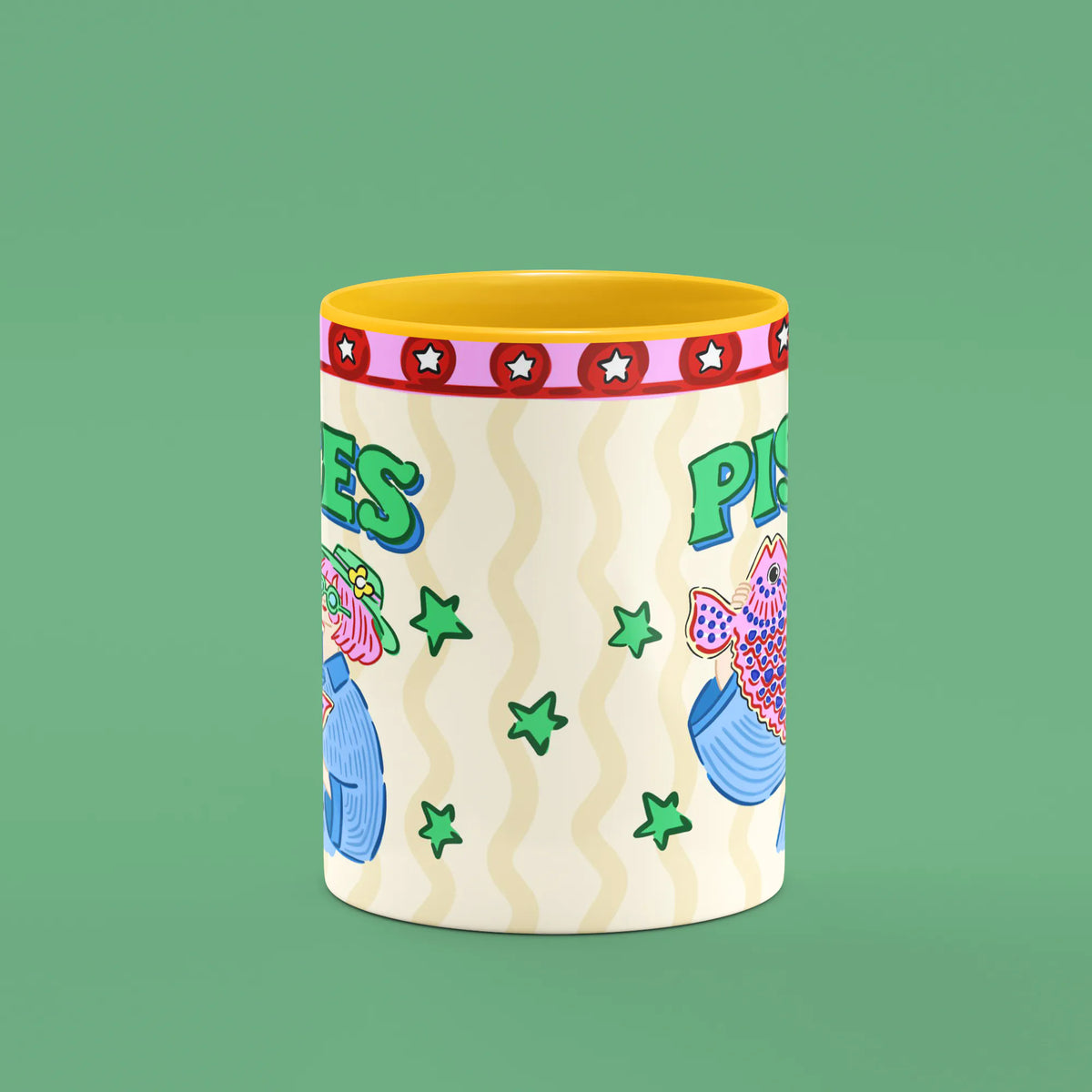 Pisces mug reverse view showing green stars and patterned fish artwork and yellow handle