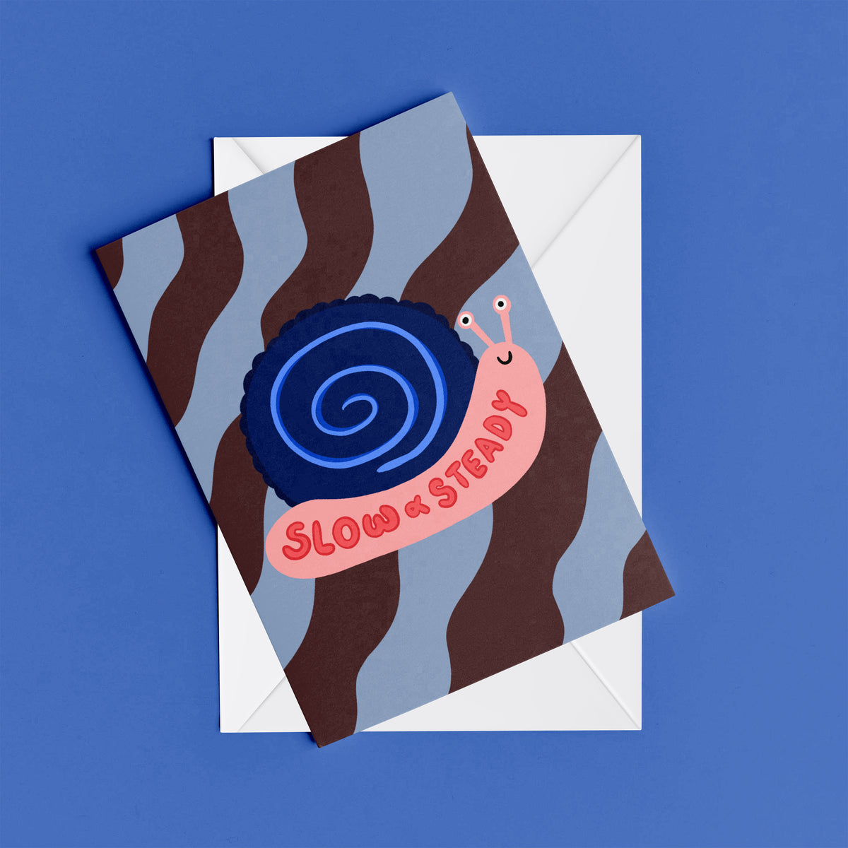 Slow and Steady print – flat lay mock-up showing the colourful illustrated design