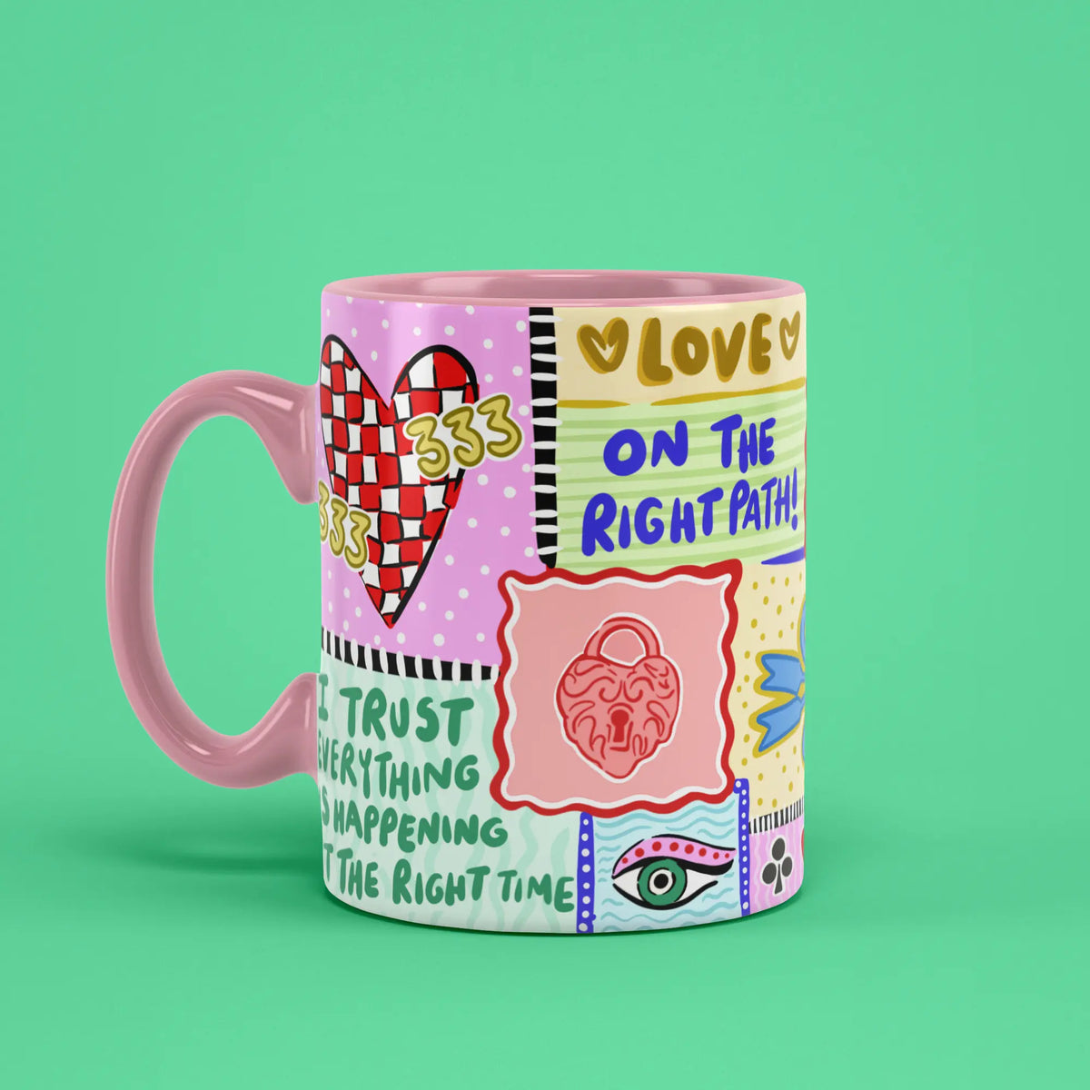 333 Angel Number Mug with colourful manifestation artwork and a pink handle on the left