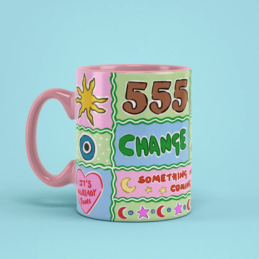 555 Angel Number Mug – manifestation cup with pink handle on left