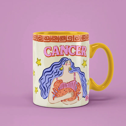 Cancer zodiac mug with a blue-haired figure holding an orange crab