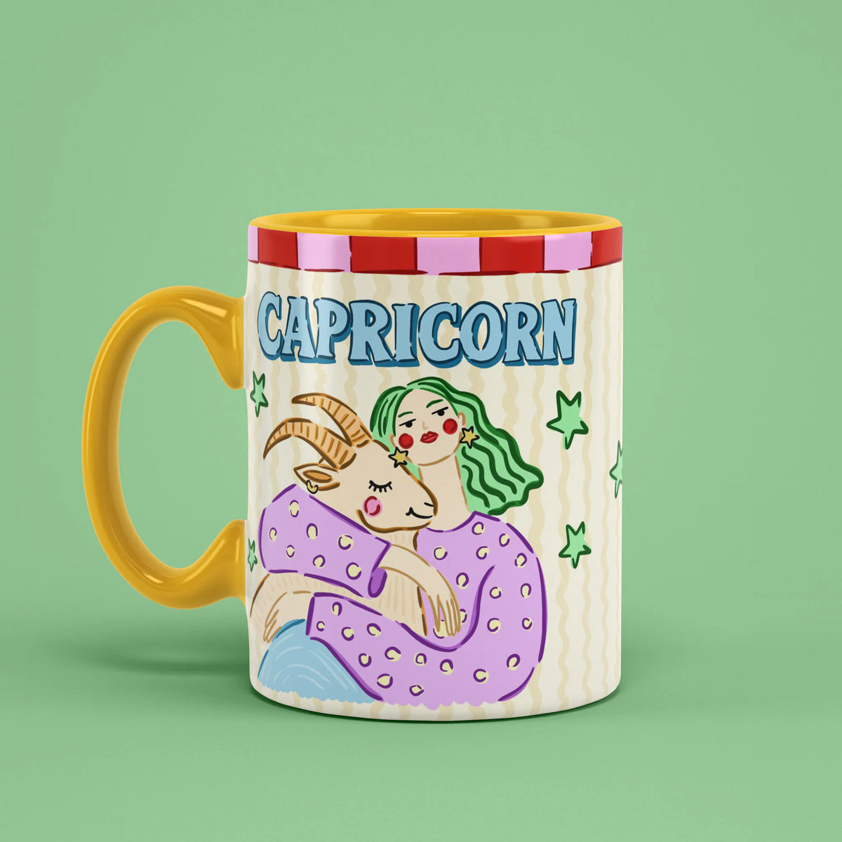 Capricorn astrology mug angled left with green stars and horned goat artwork
