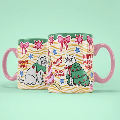 Catmas Mug – two mugs showing front and back of the Christmas cat design