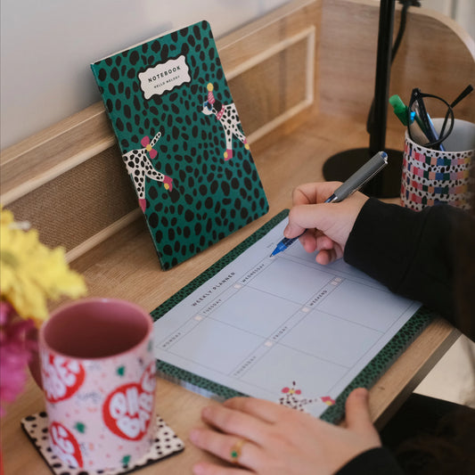 Dalmatian Planner with green spotted design and weekly tear-off layout