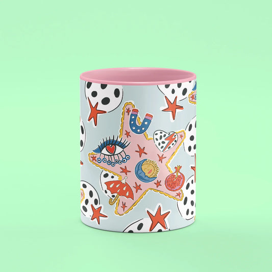Durusko Mug – front view of stars filled with lucky symbols