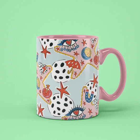 Durusko Mug – symbolic stars with eyes and suns, pink handle on right