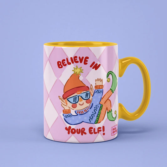 Elf Mug – Believe in Your Elf illustration, yellow handle on right