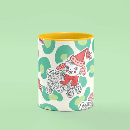Festive Zuzu Mug – front view of Zuzu the poodle with red bows