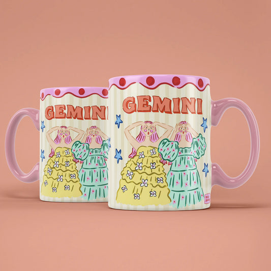 Two Gemini star sign mugs showing two illustrated figures with flowers and patterned outfits