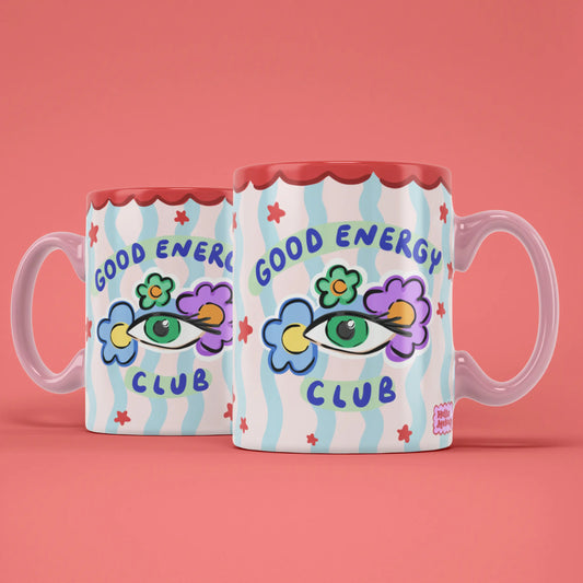 Two Good Energy Club mugs showing both sides of the positive energy design