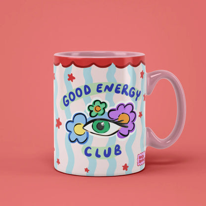 Good Energy Club Mug with colourful flower artwork and a pink handle