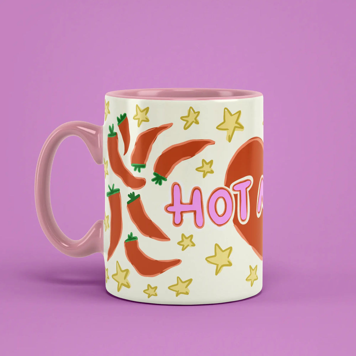 Hot Mama Mug with chilli peppers and a pink handle on the left