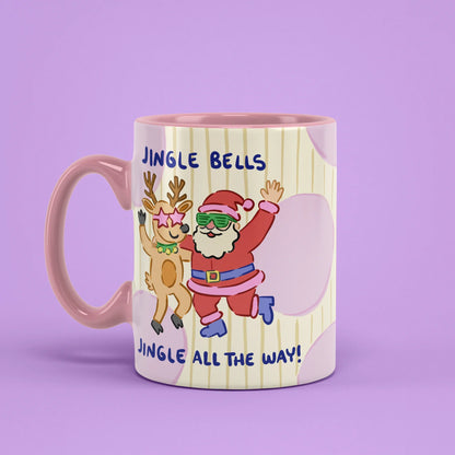 Jingle Bells Mug – festive cup with pink handle on left