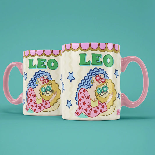 Two Leo star sign mugs showing a blue-haired figure cuddling a flower-covered lion