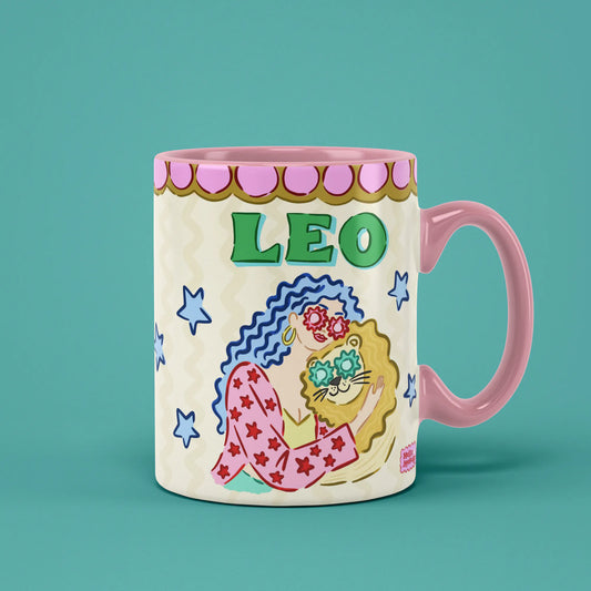 Leo zodiac mug with a blue-haired figure cuddling a flower-covered lion