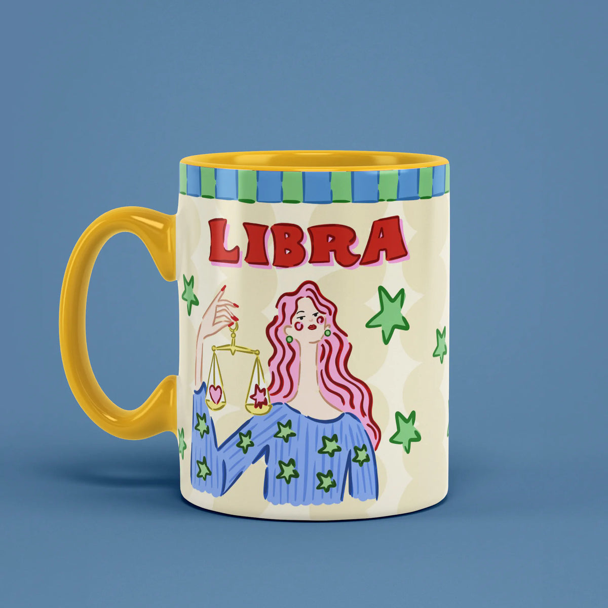 Libra astrology mug angled left with green stars and golden scales