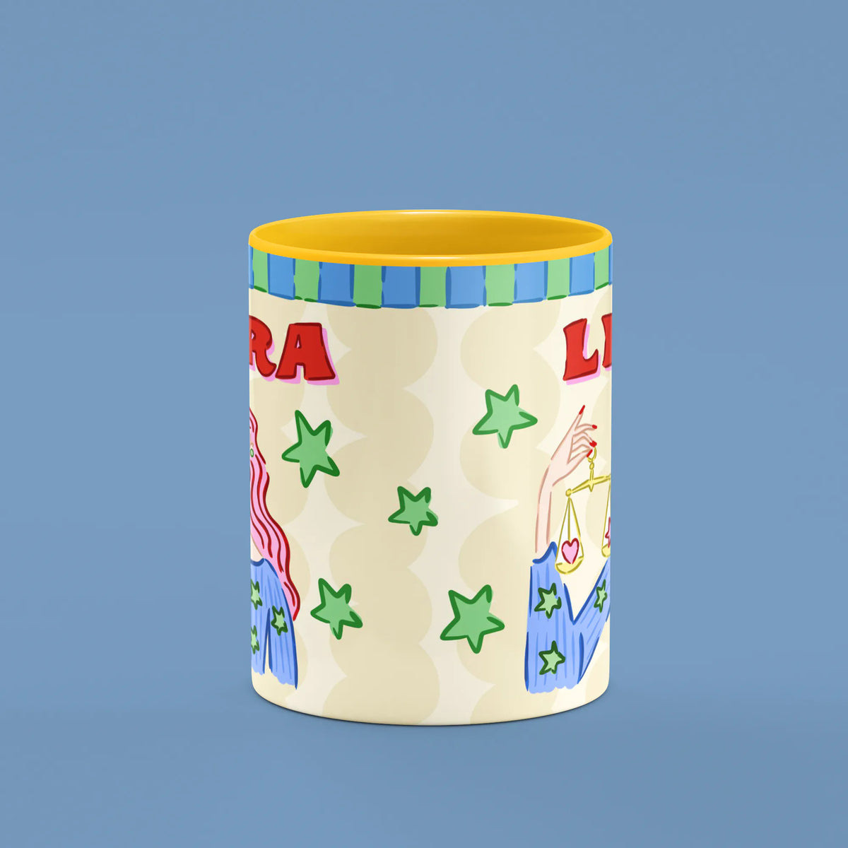 Libra mug reverse view showing green stars and golden scales and yellow handle