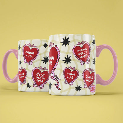 Two Mama Love mugs showing both sides of the colourful heart design