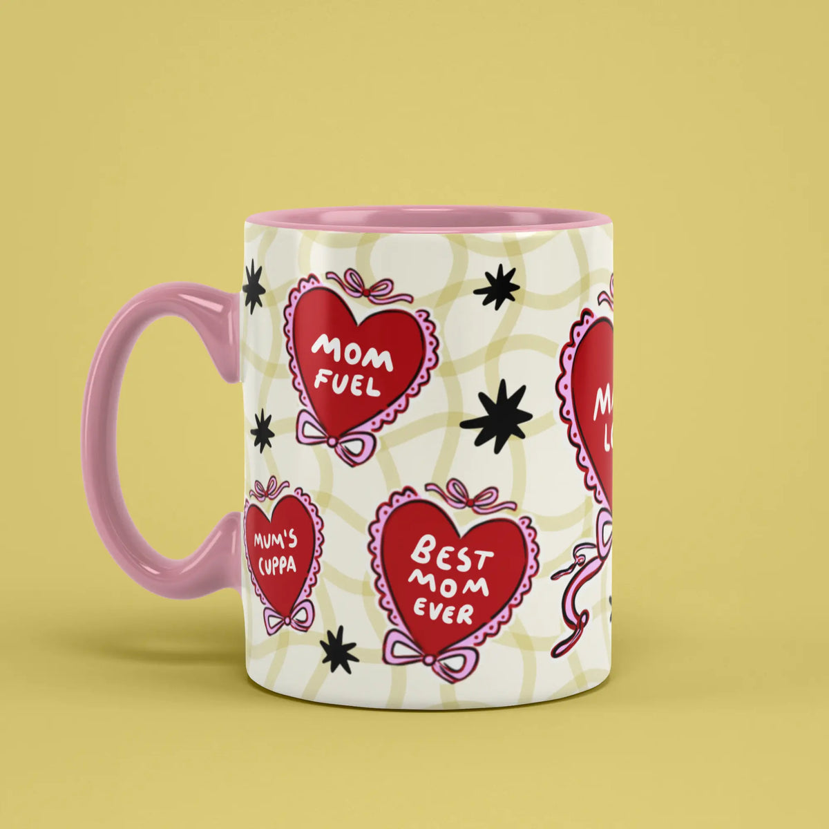 Mama Love Mug with illustrated affirmation hearts and a pink handle on the left
