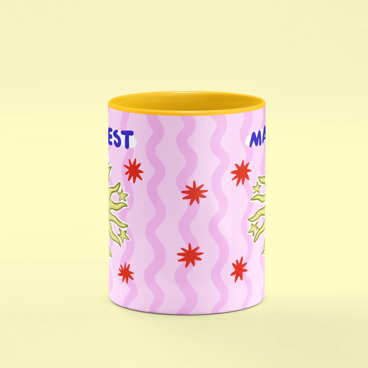 Manifest Mug – front view of sun and moon face with Manifest lettering
