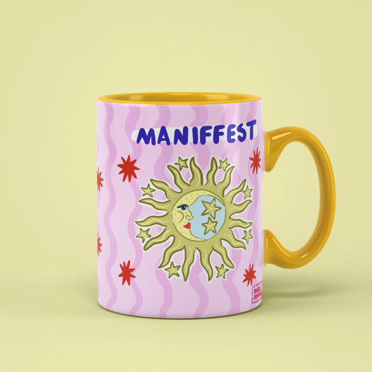 Manifest Mug – celestial sun and stars, yellow handle on right