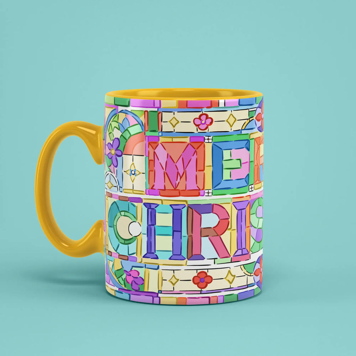 Merry Christmas Mosaic Mug with stained-glass style lettering and a yellow handle on the left