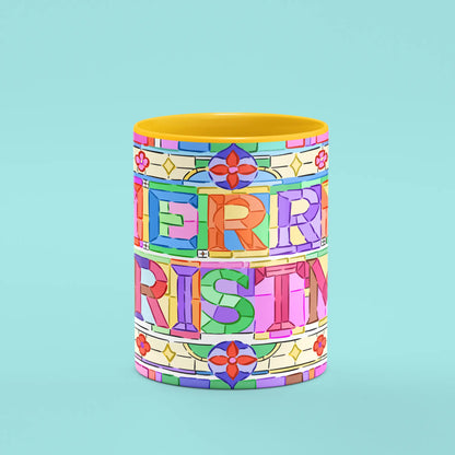 Front view of the Merry Christmas Mosaic Mug showing colourful tiled lettering