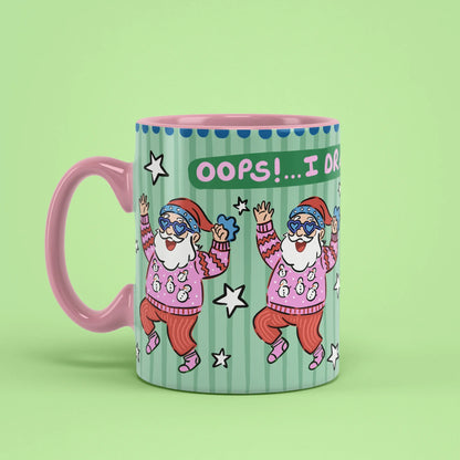 Oops Santa Mug – funny Christmas cup with pink handle on left
