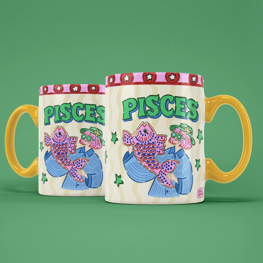 Two Pisces star sign mugs showing a blue-haired figure holding an oversized patterned fish