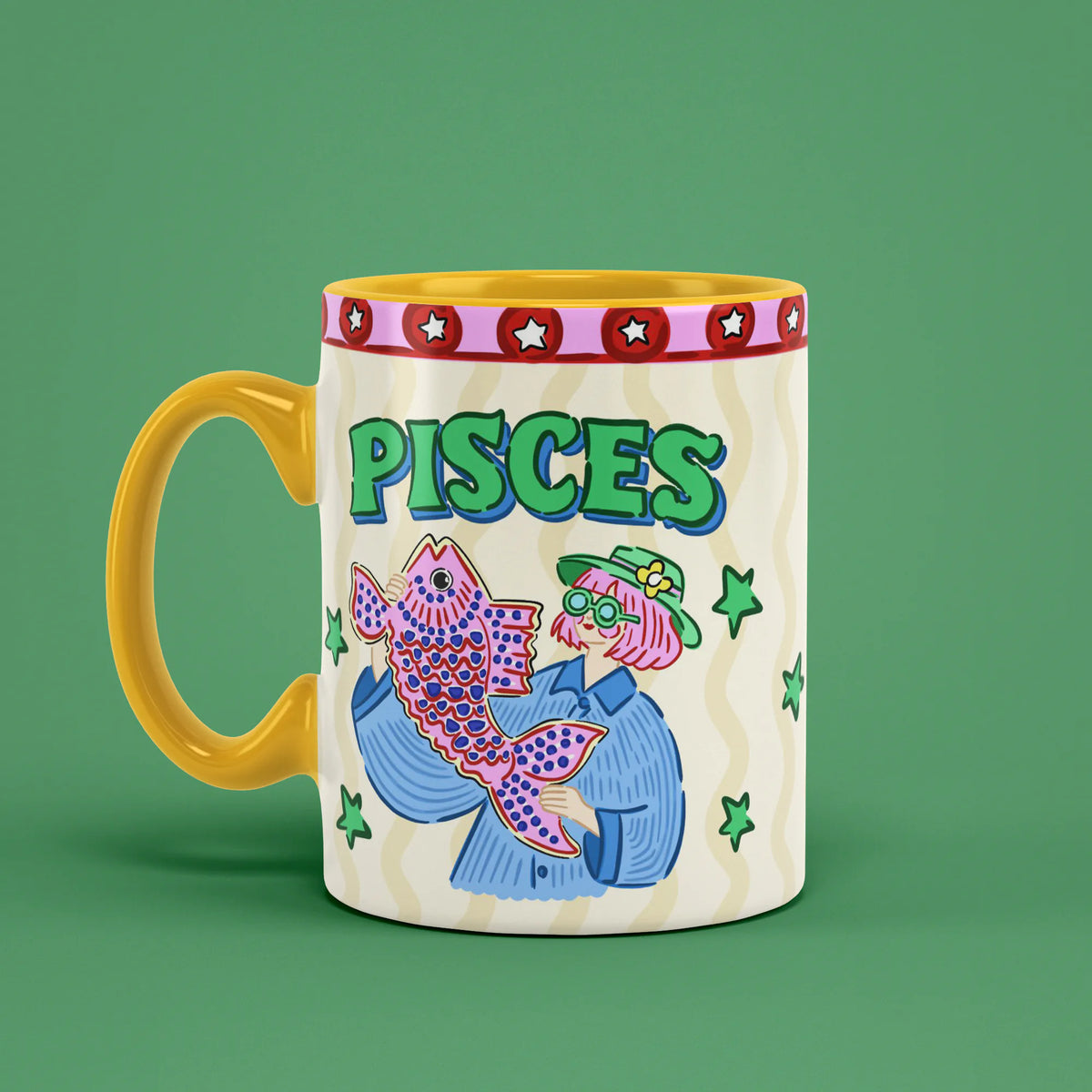 Pisces astrology mug angled left with green stars and patterned fish artwork