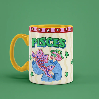 Pisces astrology mug angled left with green stars and patterned fish artwork