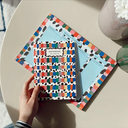 Rainbow Notebook with colourful striped cover and dalmatian-inspired pattern