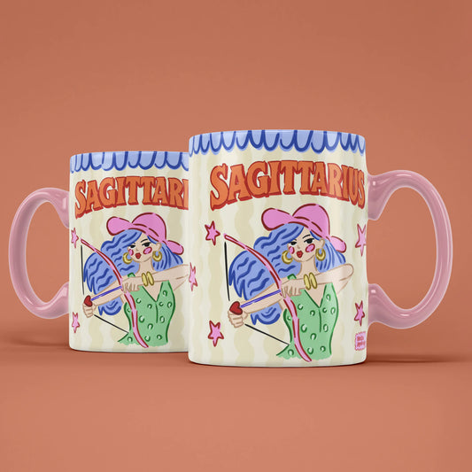 Two Sagittarius star sign mugs showing a blue-haired archer drawing a bow and arrow