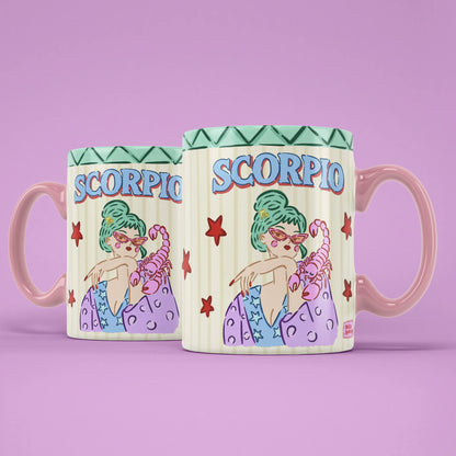 Two Scorpio star sign mugs showing a green-haired figure holding a pink scorpion