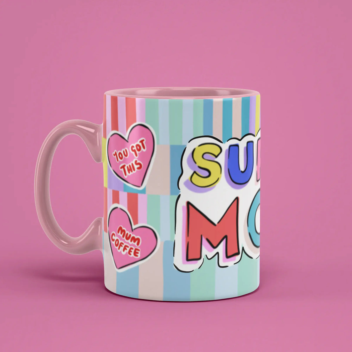 Super Mom Mug with playful heart artwork and a pink handle on the left