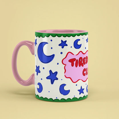 Left view of Tired Mom Club Mug with pink handle