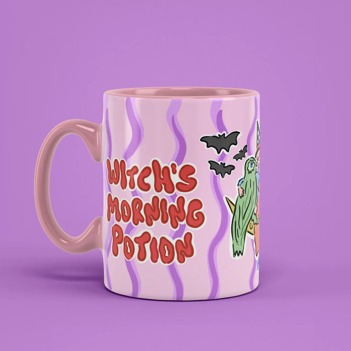 Morning Potion Mug with an illustrated witch and a pink handle on the left