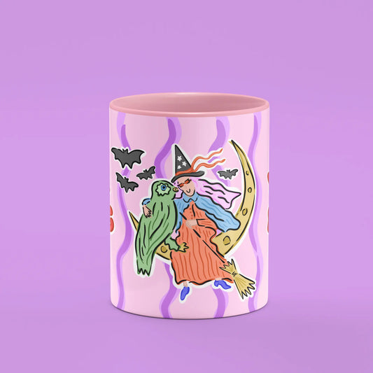 Front view of the Morning Potion Mug showing a witch on a crescent moon