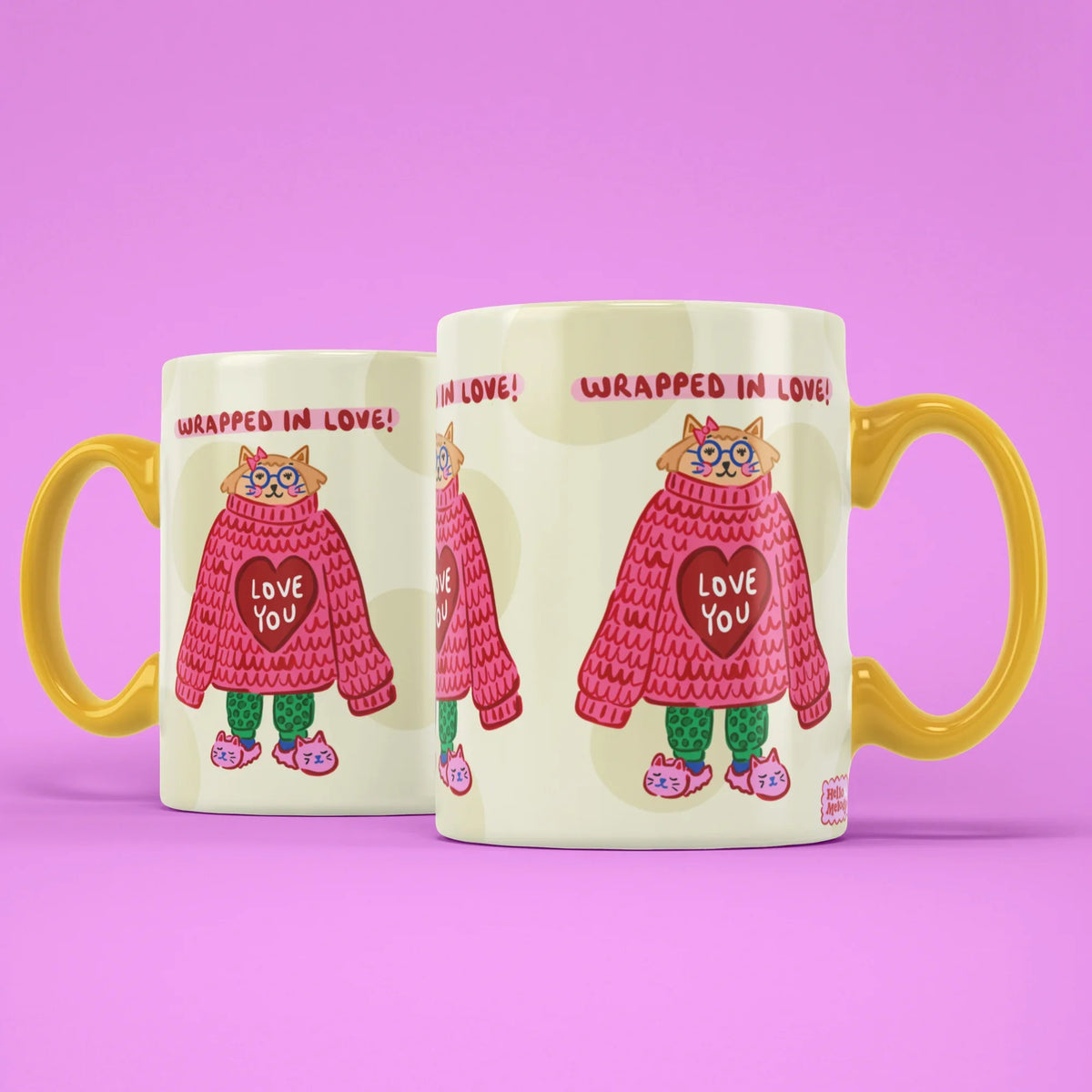 Wrapped in Love Mug – two mugs showing the front and back of the cosy cat design